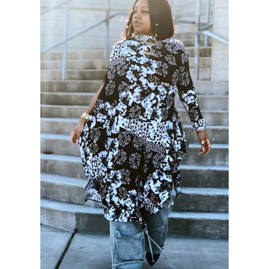 LJ Jungle Couture Asymmetrical Blouse, emphasizing the unique high-low hemline and elegant drape.