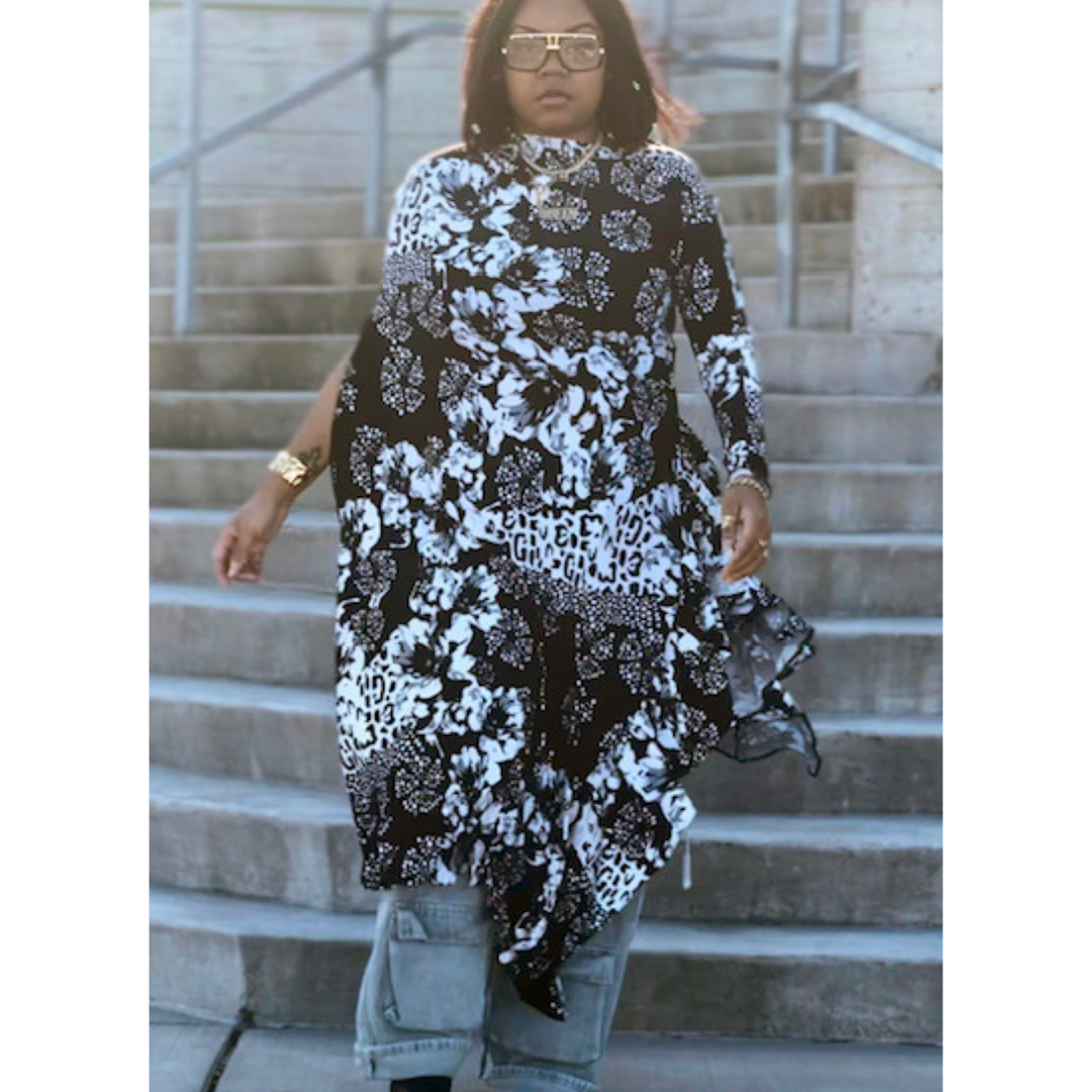 Front view of LJ Jungle Couture Asymmetrical Blouse showcasing bold animal print and flattering asymmetrical cut.