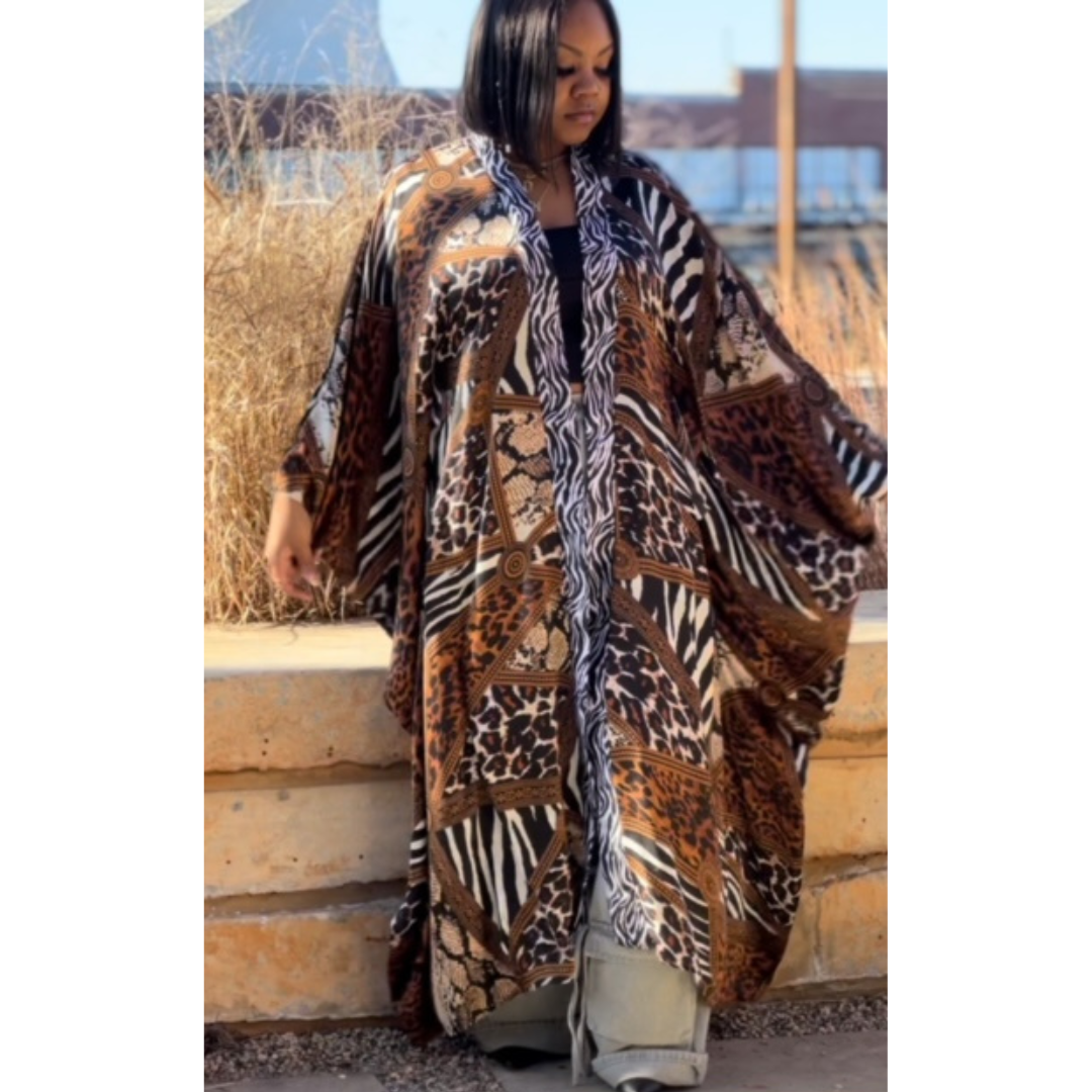 Model in the LJ Safari Serenity Kaftan Kimono, showcasing the kaftan’s relaxed fit and detailed pattern in a natural pose.
