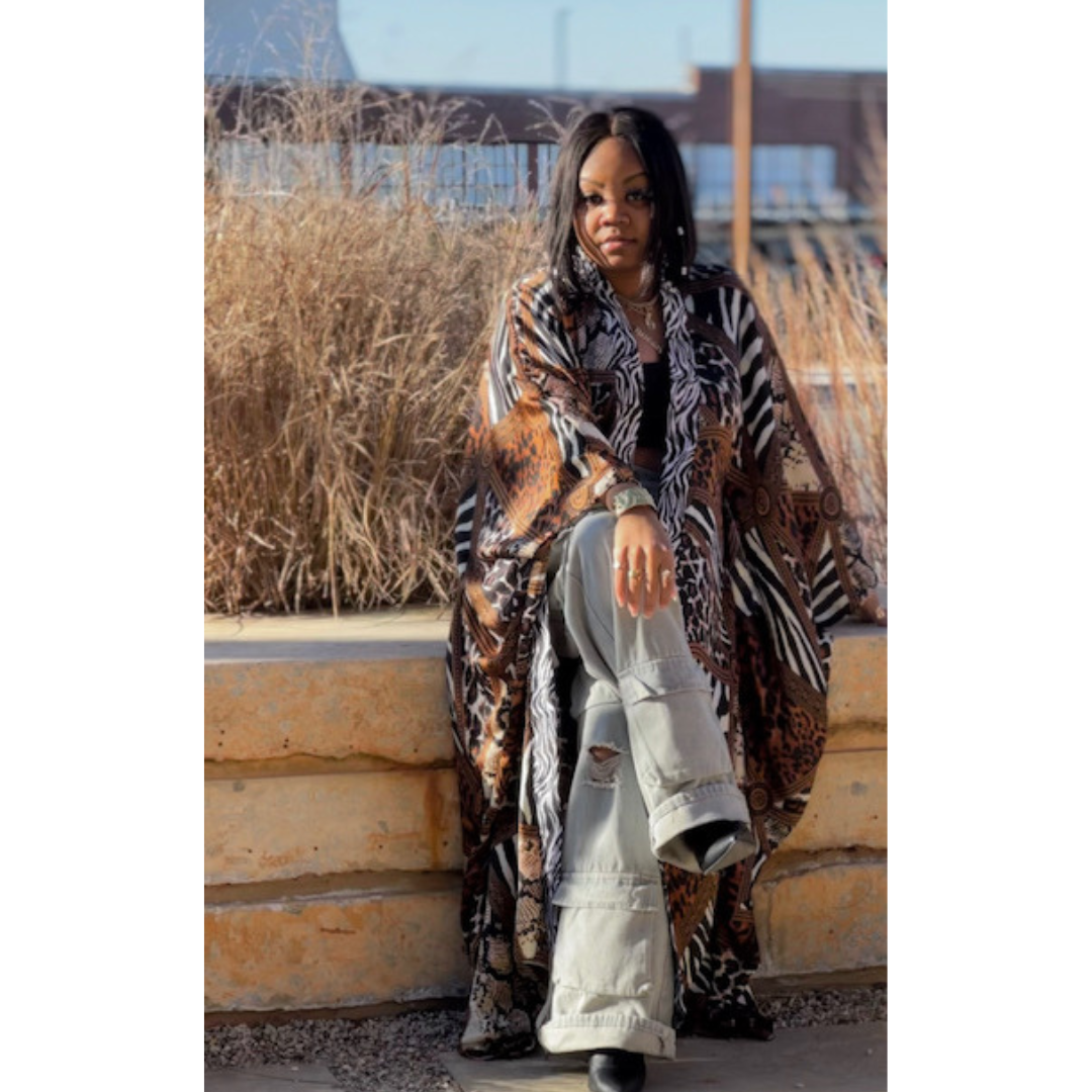 Model wearing the LJ Safari Serenity Kaftan Kimono in a full-length view, capturing the elegant flow and stylish pattern.